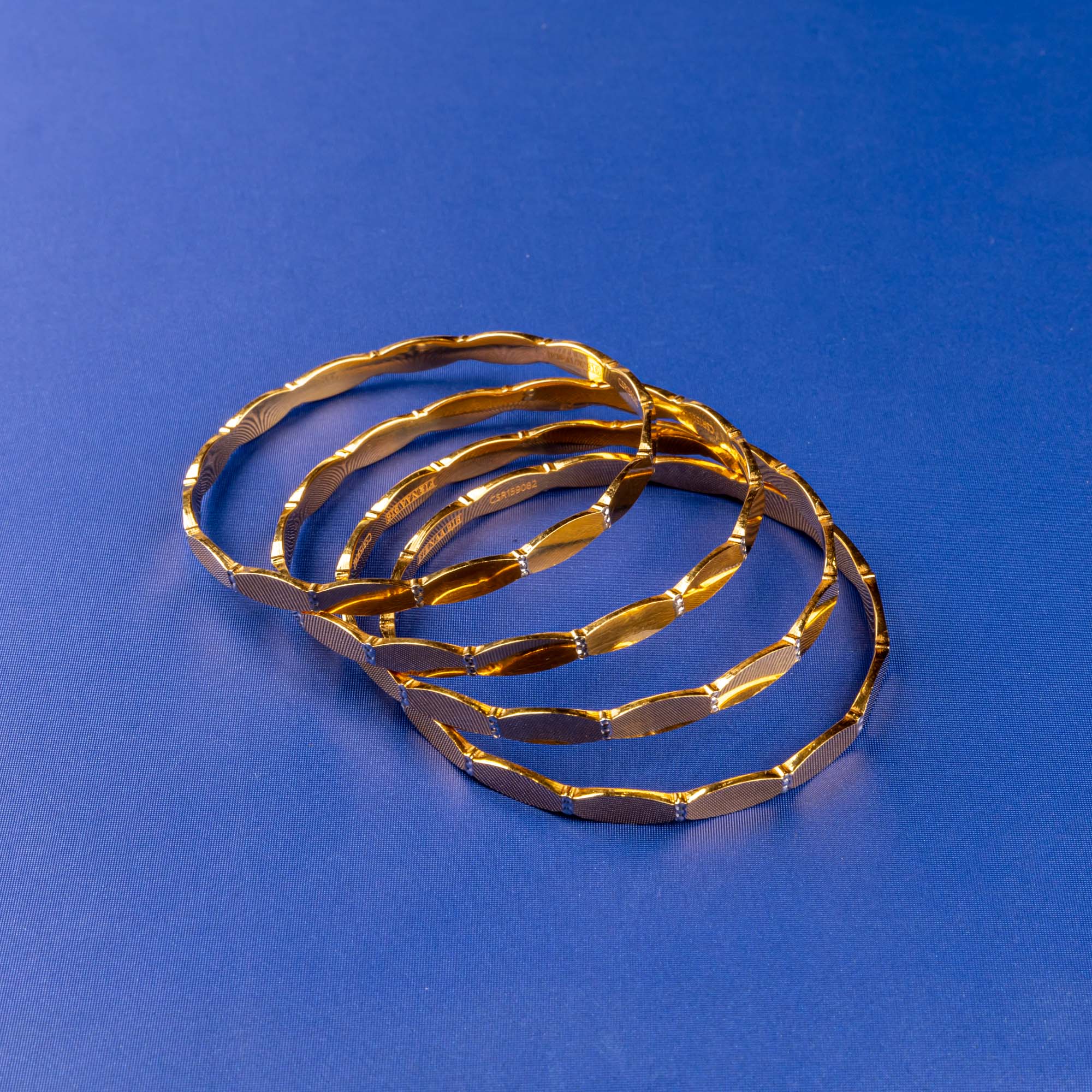 Enchanting Blends: 22K Two-Tone Gold Bangles