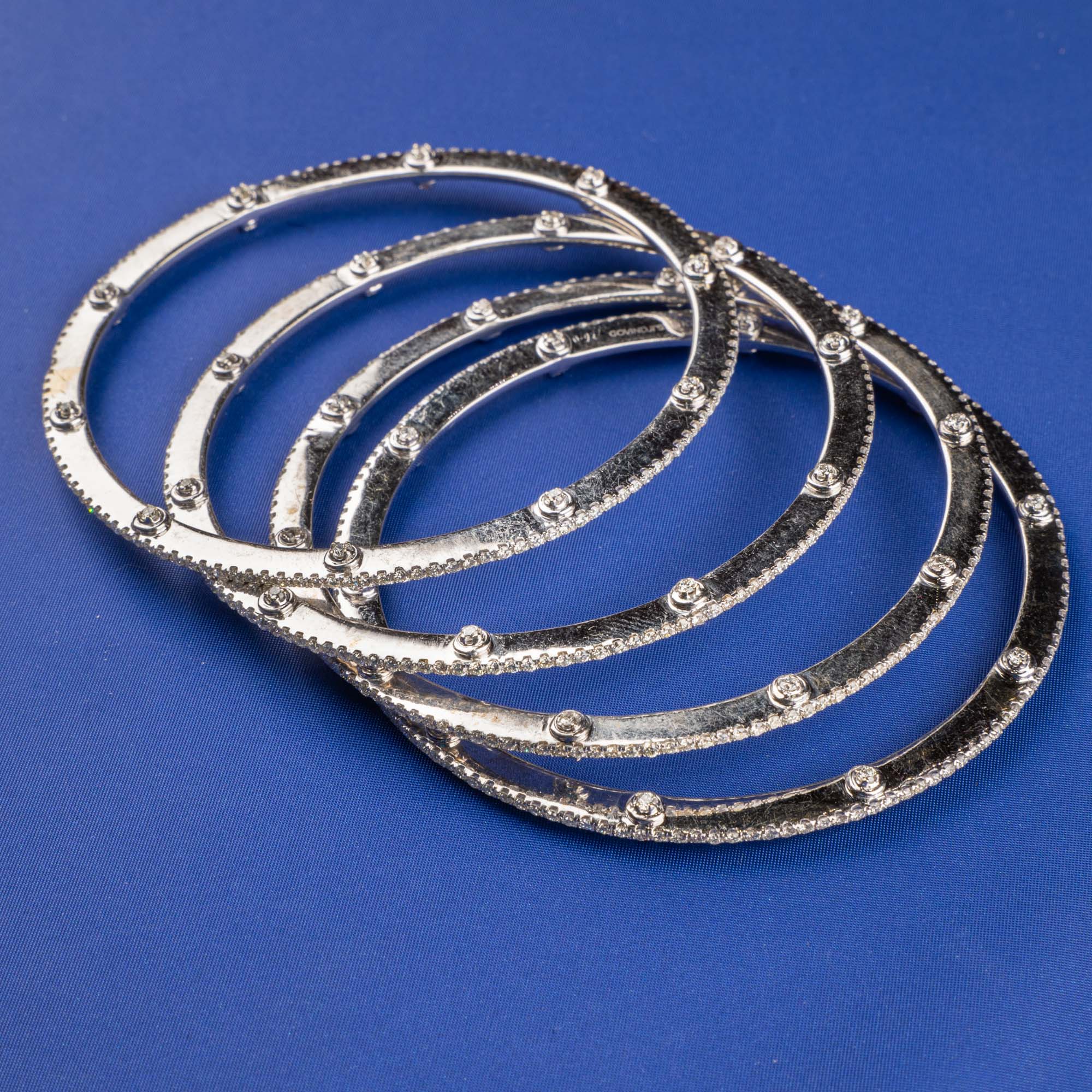 Enchanting Glamour: Handmade 18K White Gold Diamond Bangles