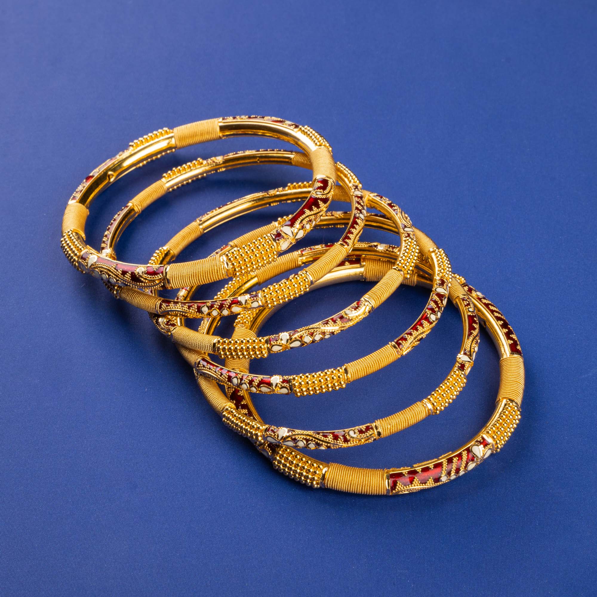 Golden Serenity: Handmade 22K Gold Minakari Bangles with Delicate Patterns