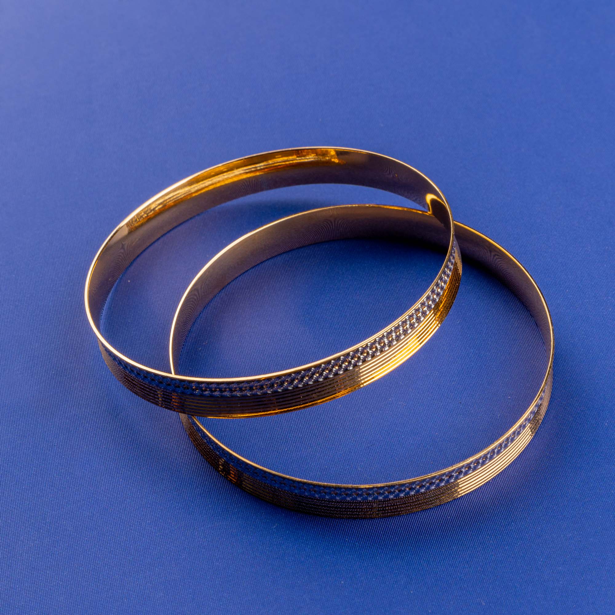 Sunset Symphony: Handmade 22K Two-Tone Gold Bangles