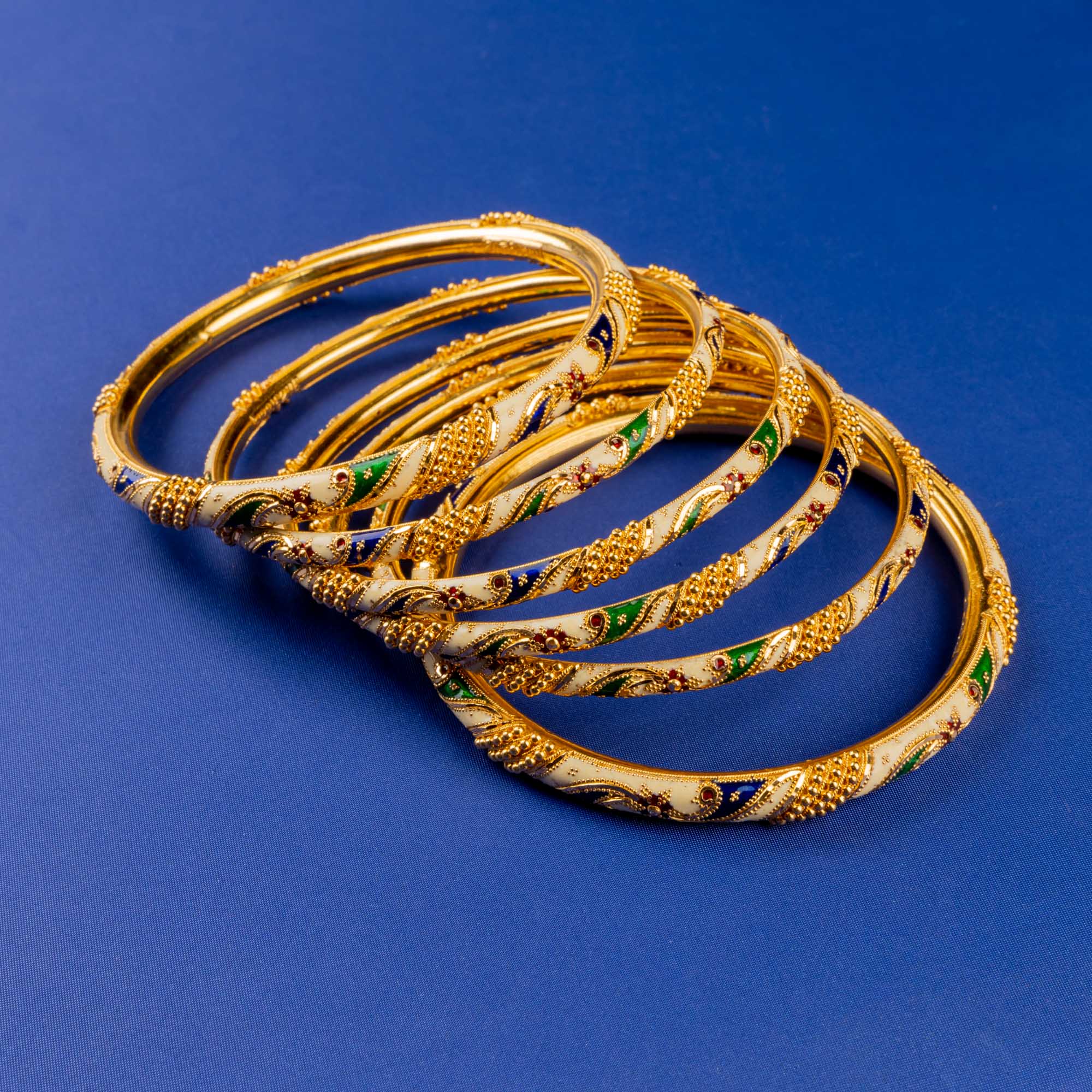 Shimmering Mirage: Handcrafted 22K Gold Bangles