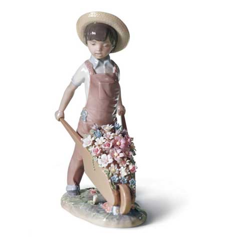 Wheelbarrow with Flowers Boy Figurine